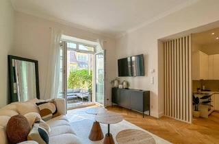 Wohnung kaufen in Liechtensteinstraße, 1090 Wien, Charmant renovierte Altbauwohnung mit Terrasse und Garten in bester Lage