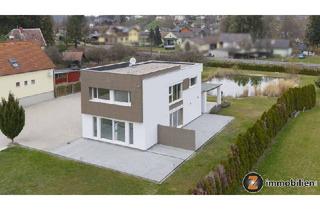 Haus kaufen in 7473 Hannersdorf, Hannersdorf: Modernes Haus mit großem Garten und Badeteich!