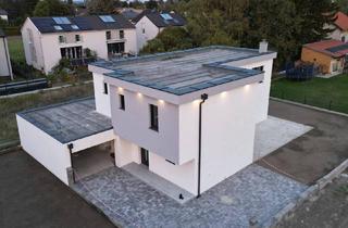 Einfamilienhaus kaufen in 2434 Götzendorf an der Leitha, Einfamilienhaus in belagsfertiger Ausführung mit großer Terrasse und Smarthome Technologie