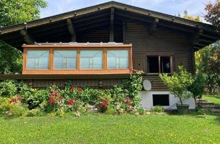 Haus kaufen in 6300 Wörgl, Einzigartige idyllische Lage: Bungalow im Blockhausstil im Grünen PROVISIONSFREI