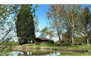 Haus kaufen in 7444 Unterloisdorf, Paradies für Naturliebhaber - Grundstück mit 2 Teichen und Fischerhütte!