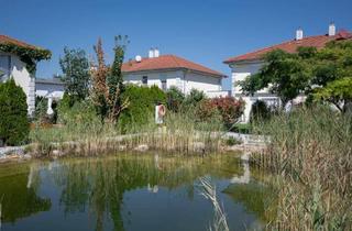 Einfamilienhaus kaufen in 7011 Siegendorf, Modernes Familienhaus mit direktem Zugang zum privaten Schwimmteich
