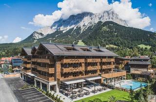 Wohnung kaufen in 6632 Ehrwald, Tiroler Alpenzauber: Luxuriöses Gartenapartment am Fuße der Zugspitze