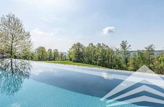 Villen zu kaufen in 4048 Puchenau, Stadtnahe High-End Villa mit unverbaubarem Naturblick & Infinity-Pool!