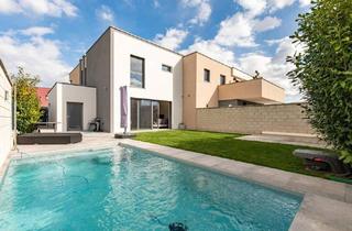 Haus kaufen in 2460 Bruck an der Leitha, ERSTBEZUG : Durchdacht und perfekt gestaltet für zeitgemäßen Wohnkomfort