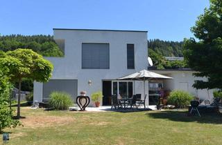 Einfamilienhaus kaufen in 9210 Pörtschach am Wörther See, Das Leben am Wörthersee genießen: Schlichtes Einfamilienhaus mit Doppelcarport in grüner Umgebung zu verkaufen