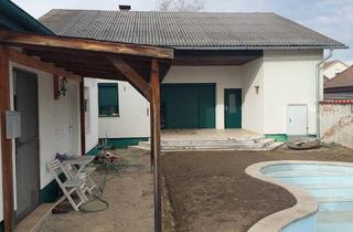Einfamilienhaus kaufen in Roman Knoll-Straße 16, 2322 Zwölfaxing, Einfamilienhaus mit Pool und ausgebautem Nebengebäude