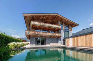 Wohnung kaufen in 6371 Aurach bei Kitzbühel, Alpine Gartenwohnung mit Private Spa und Naturteich ( 05836 )