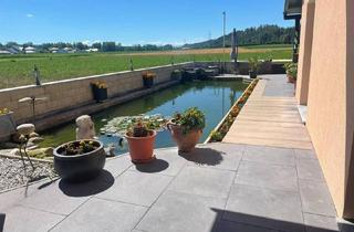 Wohnung kaufen in 5261 Uttendorf, Luxuriöses Wohnen...Traumhafte EG-Wohnung mit Pool und Teich ‍♀️