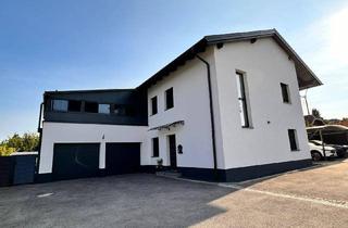 Haus kaufen in 4912 Neuhofen im Innkreis, Modern und geräumig - Anlageobjekt mit zwei Wohnungen