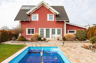 Einfamilienhaus kaufen in 7111 Parndorf, Vollunterkellertes Ziegelmassiv-Einfamilienhaus, beheiztes Pool, Terrasse und Grillplatz!