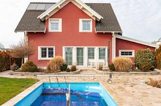 Einfamilienhaus kaufen in 7111 Parndorf, Vollunterkellertes Ziegelmassiv-Einfamilienhaus, beheiztes Pool, Terrasse und Grillplatz!