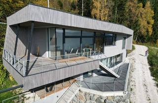 Villen zu kaufen in 9551 Bodensdorf, Außergewöhnliches Wohnhaus mit traumhaftem Panorama- und Seeblick auf den Ossiacher See!