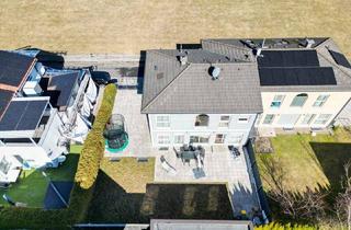 Mehrfamilienhaus kaufen in 6404 Polling in Tirol, Exklusives Mehrfamilienhaus mit zwei Wohneinheiten, großzügigen Terrassen und Alpenblick