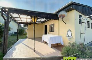 Haus kaufen in 7035 Steinbrunn, "die Badesaison genießen" Pachtgrund mit Bungalow mit großem Garten und Pool in der Feriensiedlung beim Badeteich Steinbrunn