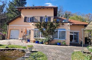 Villen zu kaufen in 7000 Eisenstadt, Traumhafte Architektenvilla in Eisenstadt: 5 Zimmer, Garten, Balkon und Garage!