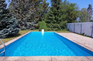 Haus kaufen in 2491 Neufeld an der Leitha, Gönnen Sie sich tolle Annehmlichkeiten (Pool, Sauna, 2 Carports, 1 Garage...) nur 5 Min vom See entfernt!