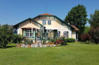 Villen zu kaufen in 2434 Götzendorf an der Leitha, Traumvilla 30 min. von Wien: 2.000 m² Grundstück - luxuriöser Wohnkomfort & idyllische Naturkulisse