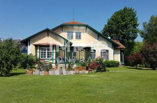 Villen zu kaufen in 2434 Götzendorf an der Leitha, Traumvilla 30 min. von Wien: 2.000 m² Grundstück - luxuriöser Wohnkomfort & idyllische Naturkulisse