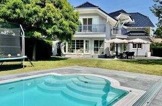Villen zu kaufen in 1220 Wien, Charmante Einfamilien-Villa mit Pool in idyllischer Ruhelage