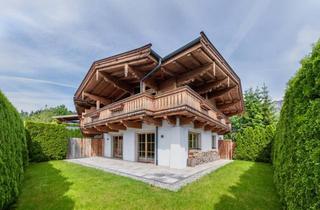 Haus kaufen in 6380 Sankt Johann in Tirol, Charmantes Doppelhauschalet mit Hornblick ( 03819 )