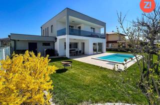 Einfamilienhaus kaufen in 4063 Hörsching, Hörsching: exklusiv • modern • zum WohlfühlenFamilienparadies mit Garten & Pool!