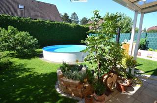 Haus kaufen in Wr. Neustadt, Wien, 2751 Steinabrückl, Sonniges Wohlfühlhaus mit Eigengrund und Keller inkl. Pool, Terrasse, Garage und Gartenhaus in Steinabrückl