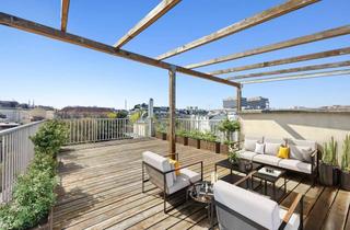Wohnung kaufen in 1090 Wien, Komfortable Dachgeschosswohnung mit freiem Ausblick, großzügigen Terrassen, Sauna und gemütlichem Kamin