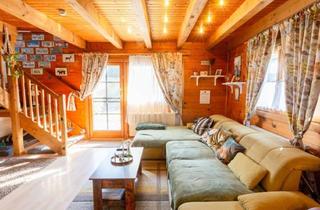 Einfamilienhaus kaufen in 2054 Alberndorf im Pulkautal, Gemütliches Blockhaus im Grünen am See - einziehen & wohlfühlen!