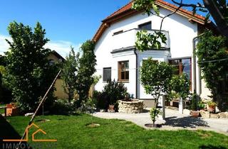 Wohnung kaufen in 7132 Frauenkirchen, **NEU**FRÜHLING IM EIGENEN GARTEN- WOHLFÜHLOASE MIT POOL, SAUNA UND GARAGE IN FRAUENKIRCHEN!
