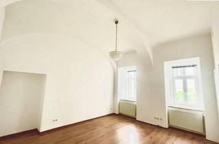 Wohnung kaufen in 1040 Wien, Ruhige Altbauperle mit Flair – im begrünten Innenhof des 4. Bezirks