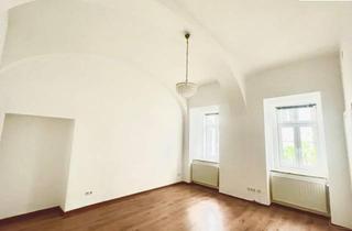 Wohnung kaufen in 1040 Wien, Ruhige Altbauperle mit Flair – im begrünten Innenhof des 4. Bezirks