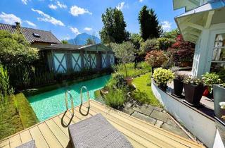 Villen zu kaufen in 5081 Anif, Traumhaus in Traumlage - kompakte Villa im New England Style mit Gartenoase und Schwimmteich