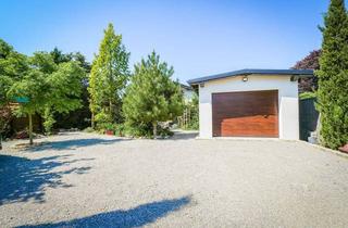 Einfamilienhaus kaufen in 2230 Gänserndorf, Exklusives Einfamilienhaus mit Pool, Garage, Gartenparadies & hochwertiger Ausstattung nahe Wien!