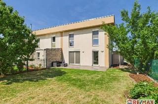 Doppelhaushälfte kaufen in 2285 Leopoldsdorf im Marchfelde, Wohnen mit Urlaubsflair – Moderne Doppelhaushälfte mit eigenem Badeteich!