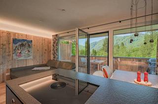Wohnung kaufen in 6384 Waidring, Stylisch möblierte Terrassenwohnung in ruhiger Lage von Waidring