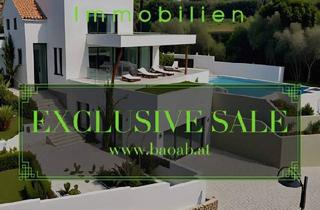 Villen zu kaufen in 9161 Maria Rain, Exklusive Architektenvilla mit Panoramablick über das Rosental bis zu den Karawanken | Pool & Garage