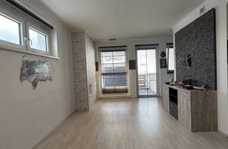 Wohnung kaufen in 2442 Unterwaltersdorf, Moderne Wohnung mit Balkon und Garage