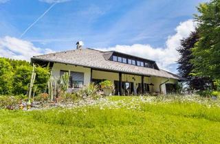 Villen zu kaufen in 9220 Lind ob Velden, Gepflegte Landhausvilla mit großer Garage und sonnigen Grundstück mit Panoramablick!