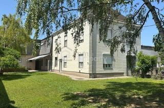 Einfamilienhaus kaufen in 2145 Hausbrunn, Mehrfamilientraum mit Business-Bonus - Wohnen & Arbeiten in Bestlage von Hausbrunn