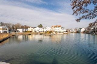 Haus kaufen in 2325 Himberg, Das HAUS am SEE umgeben von viel Naturwald, Tennisplatz/ Spielplatz inklusive - Natur PUR