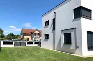 Einfamilienhaus kaufen in Gramatneusiedl, 2441 Mitterndorf an der Fischa, Design-Einfamilienhaus mit gehobener Ausstattung in 2441 Mitterndorf: 198 m², 4 Zimmer, neuwertig, Garten, Garage u.v.m.