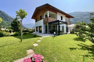 Haus kaufen in 9873 Döbriach am Millstätter See, IHR PRIVATES PARADIES IN SEENÄHE! TRAUMHAUS MIT WUNDERSCHÖN ANGELEGTEM GARTEN UND VIEL PRIVATSPHÄRE! EINE KOMPOSITION AUS MODERNE, TRADITION UND ÄSTHETIK!