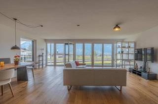 Wohnung kaufen in 6071 Aldrans, Stilvolle Gartenwohnung mit großzügiger Terrasse