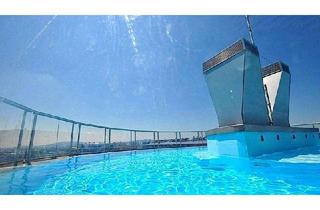 Wohnung kaufen in 1100 Wien, Wohlfühloase mit Pool und fantastischem Weitblick!