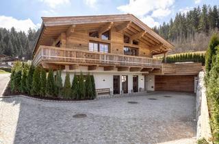 Haus kaufen in 6380 Sankt Johann in Tirol, Charmantes Chalet am Waldrand mit Aussicht