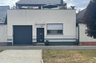 Einfamilienhaus kaufen in 7111 Parndorf, Besonderes modernes Wohnhaus mit kleiner Halle in Parndorf