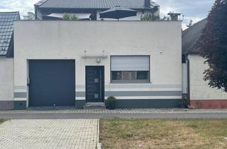 Einfamilienhaus kaufen in 7111 Parndorf, Besonderes modernes Wohnhaus mit kleiner Halle in Parndorf