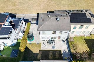 Mehrfamilienhaus kaufen in 6404 Polling in Tirol, Exklusives Mehrfamilienhaus mit zwei Wohneinheiten, großzügigen Terrassen und Alpenblick