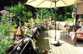 Wohnung kaufen in 5202 Neumarkt am Wallersee, Stilvoller 2,5-Zimmer-Gartentraum in Neumarkt am Wallersee